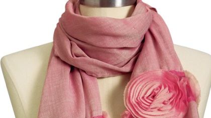 Gauzy rosette scarf, $10 at Old Navy (www.oldnavy.gap.com).