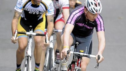 Bikers race around the Bud Harris cycling track off Washington Boulevard in the East End during a weekly race.