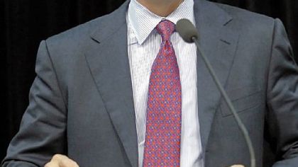 Houston Astros new baseball team owner Jim Crane answers a question during a news conference Thursday in Houston.