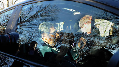 Penn State football Coach Joe Paterno leaves his house for football practice on Tuesday afternoon.
