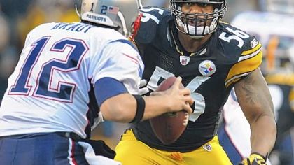 Steelers linebacker LaMarr Woodley sacks Patriots quarterback Tom Brady in the first half of a game at Heinz Field in October.