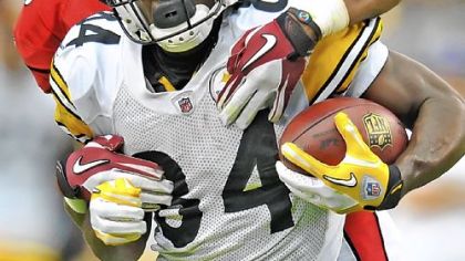 Antonio Brown picks up first down yardage against the Cardinals Sunday in Glendale, Ariz.