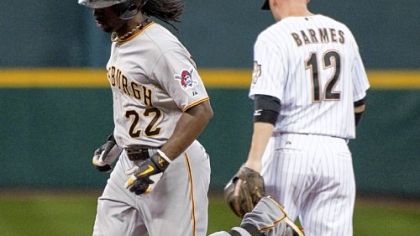 Andrew McCutchen passes Astros shortstop Clint Barmes after hitting a two-run home run in the fourth inning Monday in Houston.