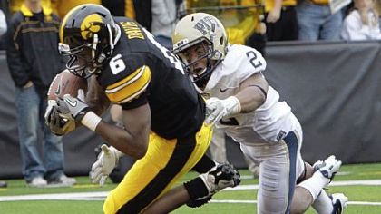 Keenan Davis tumbles into the end zone ahead of Pitt defender K'Waun Williams to score the first of the Hawkeyes' three fourth-quarter touchdowns in their rally to beat the Panthers, 31-27, Saturday in Iowa City, Iowa.