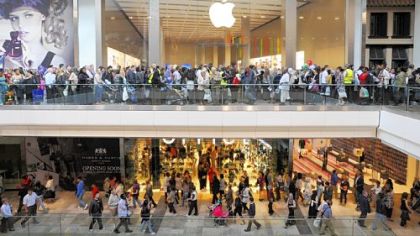 Customers visit the newly opened Westfield Stratford City shopping center in east London.