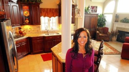 Julie Bertoline in the kitchen of her Greensburg home, which is a stop on the Art in the Kitchen Tasting Tour to benefit the Westmorland Museum of American Art.