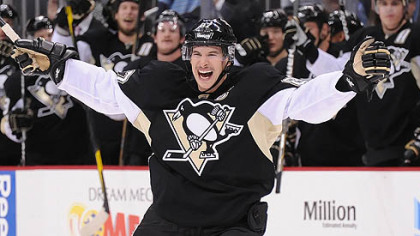 Center Sidney Crosby celebrates his second goal of the game Monday at the Consol Energy Center. The Penguins went on to beat the New York Islanders, 5-0.