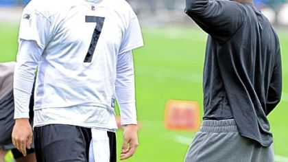 Roethlisberger and Mike Wallace enjoy a lighter moment before the start of practice Wednesday at the team's South Side facilities. Roethlisberger has passed for 1,937 yards == 730 of them to Wallace.