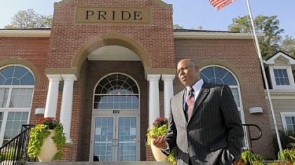 A. Fulton Meachem Jr., executive director of the Housing Authority of the City of Pittsburgh, in front of the Pride Center at the Garfield Commons housing complex in Garfield.