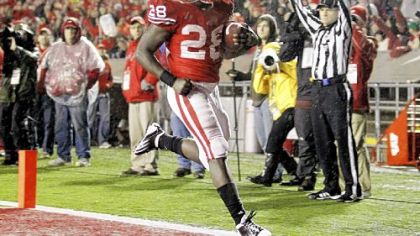 Wisconsin's Montee Ball runs into the end zone for an 18-yard touchdown Saturday against Penn State in Madison, Wis. Wisconsin won 45-7 to advance to the Big Ten championship game.