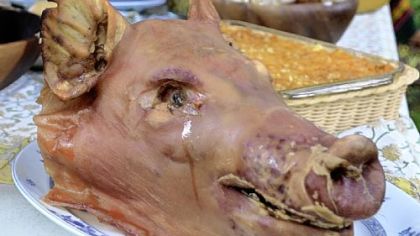 Roasted pig head.
