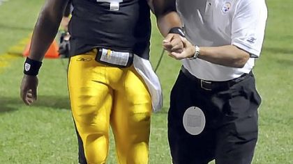 Steelers quarterback Byron Leftwich is helped off the field after getting injured against the Falcons in the third quarter at Heinz Field Saturday.