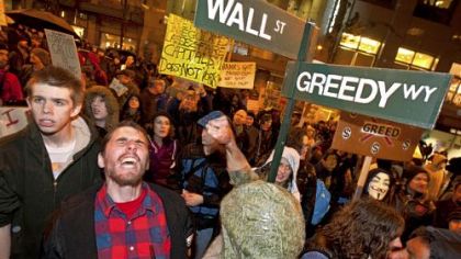 Demonstrators from the Occupy Seattle movement outside the Sheraton Hotel in Seattle where JP Morgan Chase Chief Executive Officer Jamie Dimon was due to speak at the "Business Leadership Celebration" on Nov. 2.