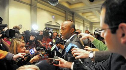 Kenneth Frazier, a Penn State trustee since 2009, speaks to the media after a board of trustees meeting at the Nittany Lion Inn on Friday.
