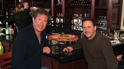 Dan Marino, left, and Anthony Bruno of Anthony's Coal Fired Pizza. Mr. Marino is one of the equity partners in a Florida-based restaurant group, which is set to open its first Pittsburgh-area location in Robinson on Saturday.