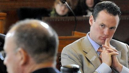 Mayor Luke Ravenstahl, shown right listening to city councilman  Bruce Kraus, will deliver his 2012 budget to the Intergovernmental Cooperation Authority today.
