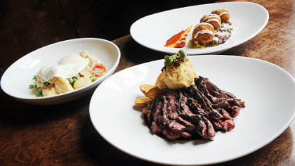 The hangar steak (front), falafel (right) and gnocci (left) served at Root 174 in Regent Square.