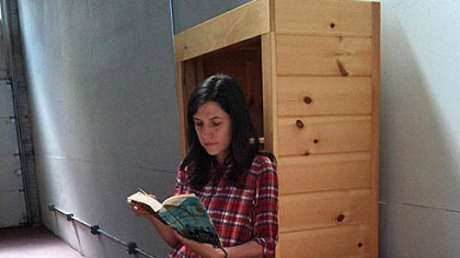 Lesley Rains is the creator of the East End Book Exchange, a pop-up bookstore. Here, she samples products while displaying at the Pittsburgh Public Market on Sunday.