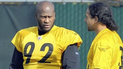 Linebacker James Harrison, talking with Troy Polamalu, right, returned to practice Wednesday for the first time since breaking the orbital bone around his right eye Oct. 2. The question: Will he/can he play Sunday?
