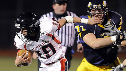 Upper St. Clair quarterback Pete Coughlin carries Friday against Central Catholic. Coughlin started the game in place of an injured Dakota Conwell.