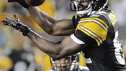 Jerricho Cotchery pulls in a pass Aug. 18 against the Eagles.