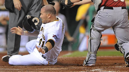 Ryan Doumit is tagged out at home in the eighth inning by the Astros  catcher Humberto Quintero. Still, the Pirates picked up the winning run on Jason Jaramillo's single.