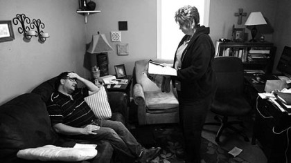 Eric Chiado and Kelly Knieling decompress at home after their workdays. Mr. Chiado is an engineer at Civil & Environmental Consultants Inc. Ms. Knieling works in merchandising at Giant Eagle stores with Advantage Sales and Marketing.