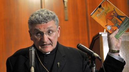 Holding a church publication about dealing with children, Pittsburgh Catholic Bishop David A. Zubik denies he had inappropriate contact with a student while vice principal at Quigley Catholic High School in Baden.