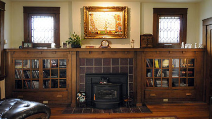 The shelving unit provides ample space for storage and display.
