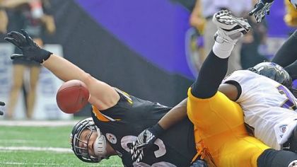 Tight end Heath Miller loses control of a pass from Ben Roethlisberger in the Steelers' 35-7 loss Sunday against the Baltimore Ravens. "There'd be something wrong if we don't expect more from ourselves," Miller said.