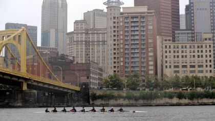 Rowers cruise along the Allegheny River during Saturday's 25th anniversary Head of the Ohio rowing regatta, which updated its course for this year's race.
