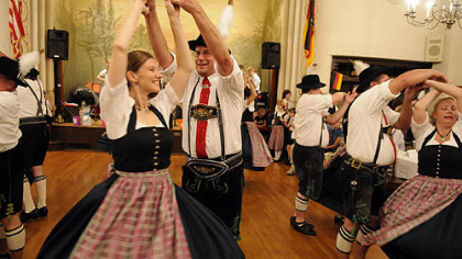 Sara Nuenner and Jim Viel, at left, with at right, Donna and Dave Dickson, of the dance group Alpen Schuhplattler und Trachtenverein D' Pittsburgher at the Bavarian Alpen Fest at Teutonia Mannerchor.