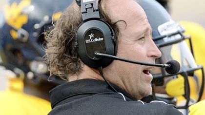 Dana Holgorsen got the victory against Marshall Sunday in his debut at West Virginia. But the coach showed some frustration in the second half.