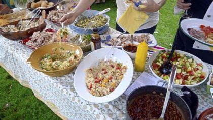 Spread of food at Gretchen McKay's pig roast.