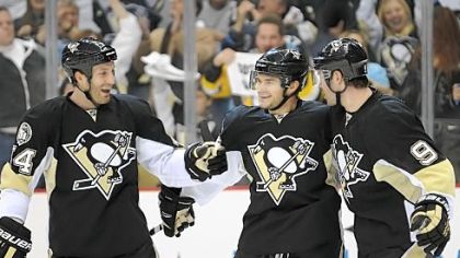 Penguins teammates voted Brooks Orpik, left, their Players' Player award last season, their highest honor.