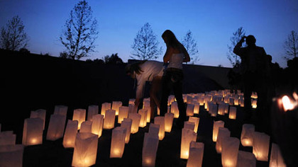 Volunteers light thousands of candles Saturday at the Flight 93 Memorial to honor the victims of all the Sept. 11, 2011, terrorist attacks.