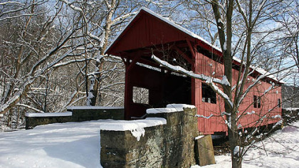 The Hughes Covered Bridge in snow in 2009. The bridge now is used only for foot traffic. It stands just to the east of I-79 near the Marianna/Prosperity exit.