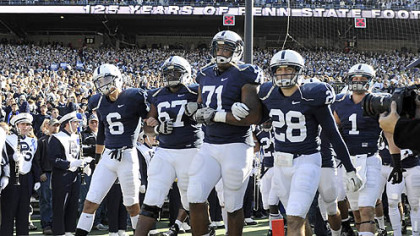 Penn State players come onto the field before their game against Nebraska Saturday.