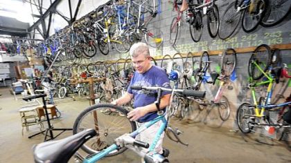 At Free Ride Pittsburgh in Point Breeze, bike repair volunteer Tim Linnon, comes in from Butler a couple times a month.