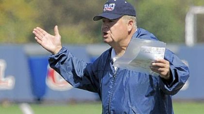 Robert Morris head coach Joe Walton questions a call during a 2010 against Liberty.