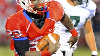 Chartiers Valley quarterback Wayne Capers runs for a 47-yard touchdown against Belle Vernon in the first half Friday at Chartiers Valley High School.