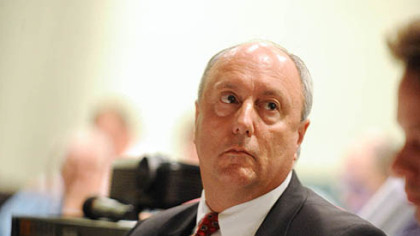 Kenneth S. Komoroski, counsel for Range Resources, listens at the zoning board meeting.
