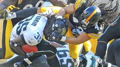 Troy Polamalu tackles Jaguars running back Deji Karim for a loss in the second quarter Sunday at Heinz Field. Polamalu passed a concussion test and is cleared to play this Sunday in Arizona.