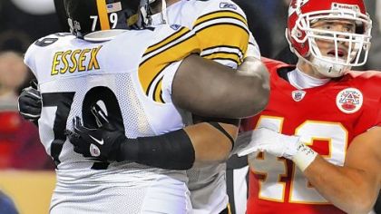 Weslye Saunders celebrates his second-quarter touchdown reception with Trai Essex. The only touchdown of the game, it put the Steelers ahead, 10-3, against the Chiefs at Arrowhead Stadium in Kansas City, Mo.