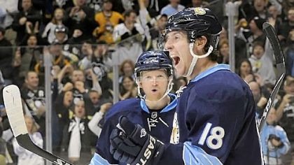 James Neal celebrates a goal scored on the Islanders' Evgeni Nabokov in the third period at Consol Energy Center Thursday night. The Penguins won, 3-2, in a shootout.