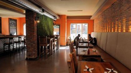 The dining room and bar area of the Alchemy N' Ale in Lawrenceville.